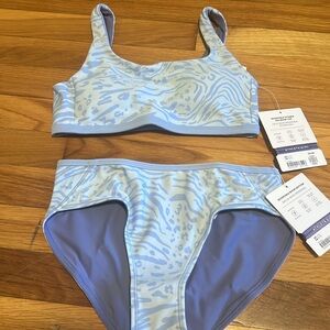 Athleta Girl 2-piece bathing suit, in original packaging.
